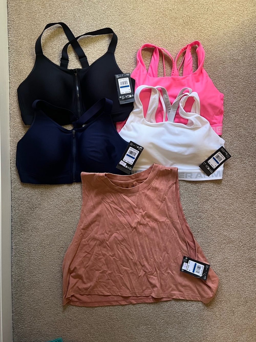 NWT - Lot of 4  - XL - Under Armour Women’s Sports Bras AND 1 XL muscle tank